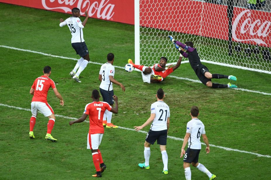 Johan Djourou of Switzerland clears the ball off the goal line.