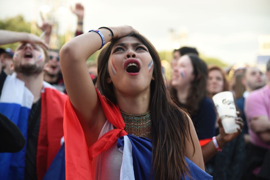 A French fan reacts during the game. 