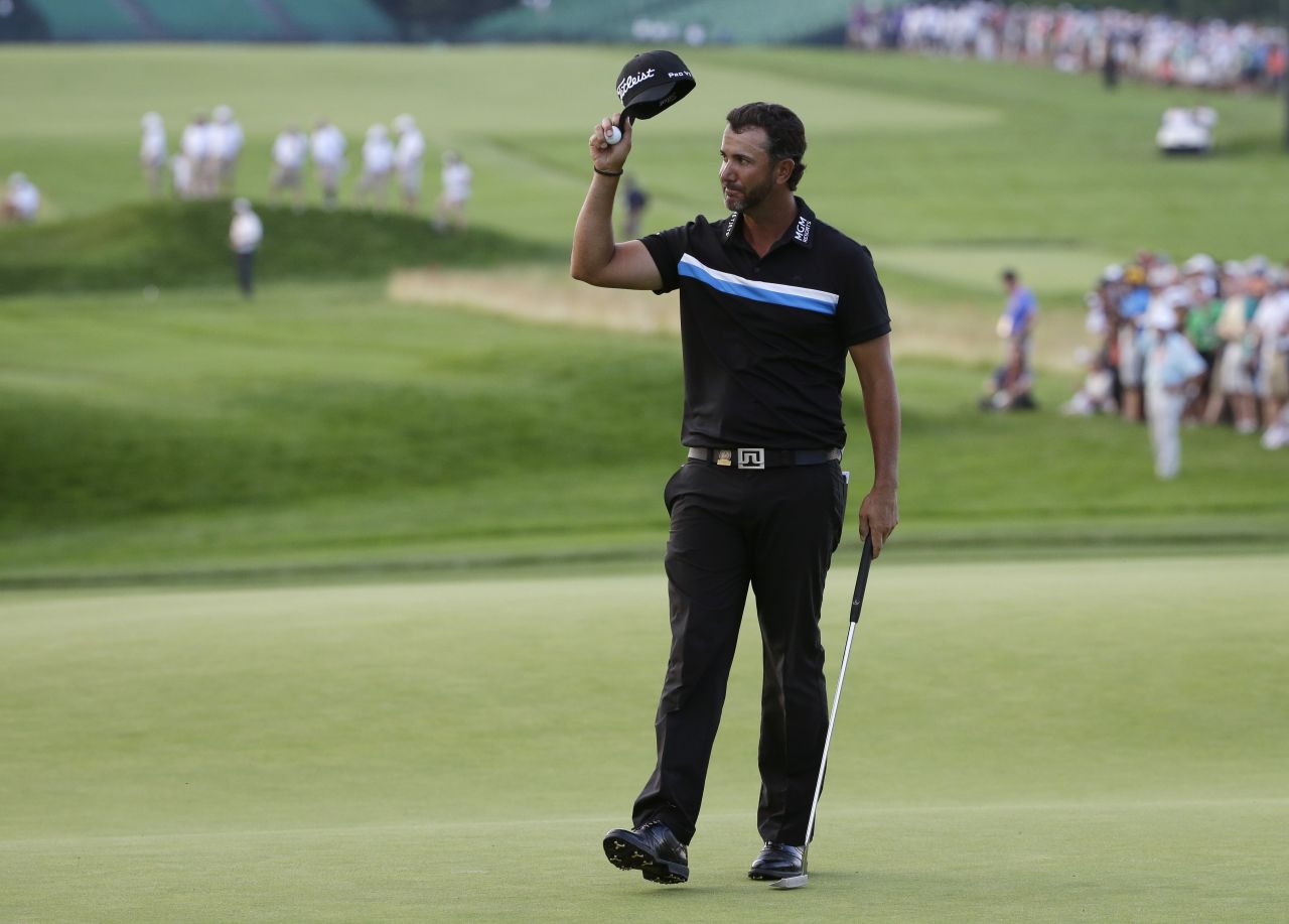Scott Piercy waves after finishing the 18th hole on June 19. 