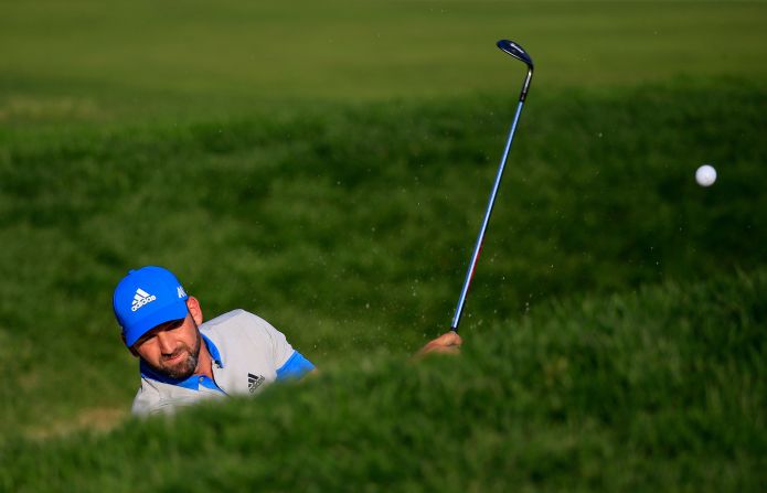 Sergio Garcia of Spain plays out of the bunker on the 16th hole on June 19. 