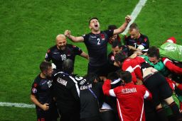 Albania players celebrate Sadiku's goal