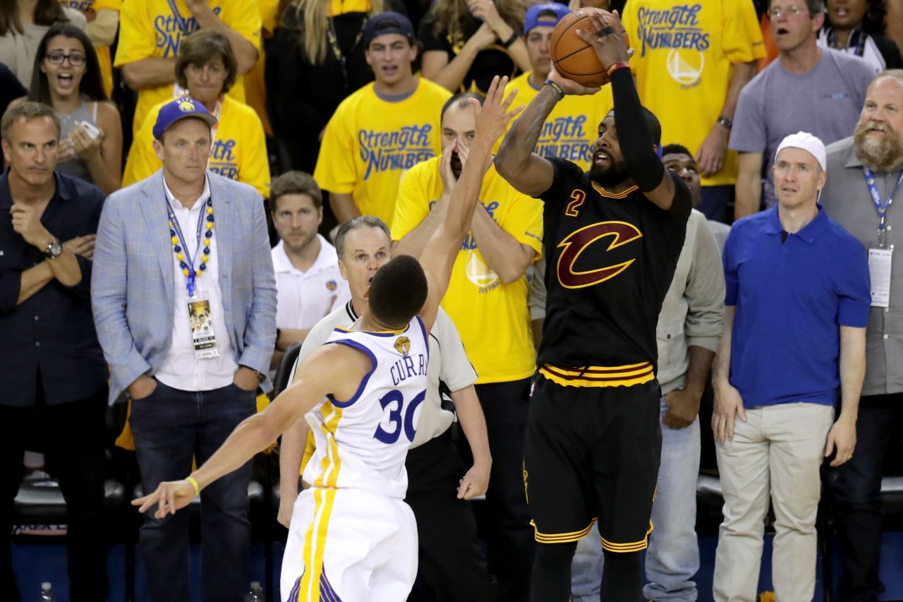 Cleveland's Kyrie Irving hits a clutch 3-pointer late in the fourth quarter. He finished with 26 points.