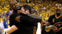 OAKLAND, CA - JUNE 19:  LeBron James #23 and Kevin Love #0 of the Cleveland Cavaliers celebrate after defeating the Golden State Warriors 93-89 in Game 7 of the 2016 NBA Finals at ORACLE Arena on June 19, 2016 in Oakland, California. NOTE TO USER: User expressly acknowledges and agrees that, by downloading and or using this photograph, User is consenting to the terms and conditions of the Getty Images License Agreement.  (Photo by Ezra Shaw/Getty Images)