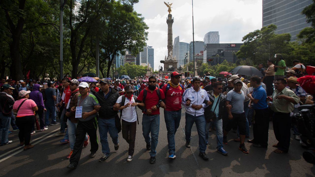 Protesters march in Mexico City on Friday, June 17.