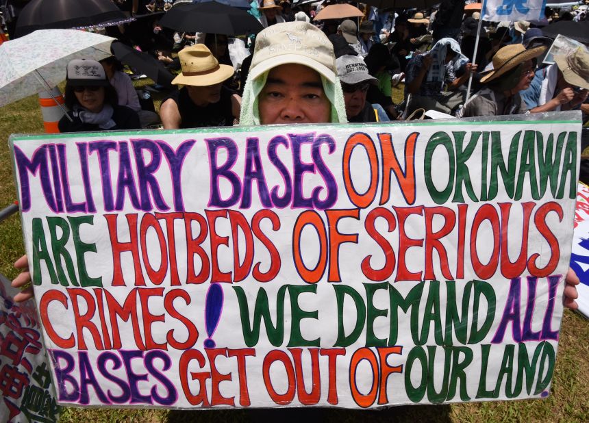 The protests followed the alleged rape and murder of a young Japanese woman by a former U.S. Marine employed as a civilian base worker. 
