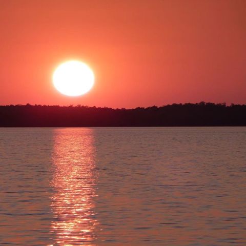 Lisa Rainwater enjoys a solstice sunset on June 19 in Everglades National Park in Chokoloskee Bay, Florida.
