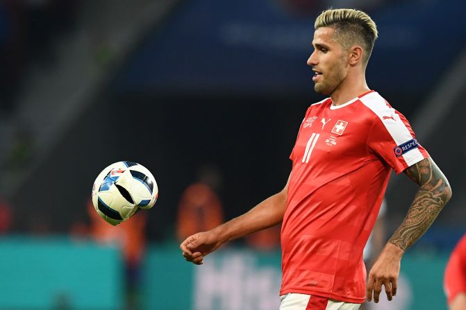PUMA wasn't the only sports goods maker that had problems druing Sunday's game. Swiss midfielder Valon Behrami's studs deflated an Adidas ball as he challenged French forward Antoine Griezmann.