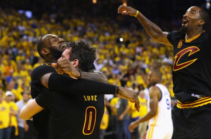 LeBron James, in tears, hugs Kevin Love #0 after the Cleveland Cavaliers defeated the Golden State Warriors 93-89 in Game 7 of the 2016 NBA Finals. James was in tears for the better part of the next half hour as he emotionally conducted post-game interviews. 