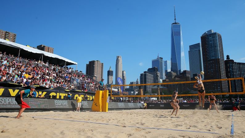 April Ross spikes the ball during a beach volleyball tournament in New York City on Saturday, June 18. Ross and her partner, Kerri Walsh Jennings, won the event.