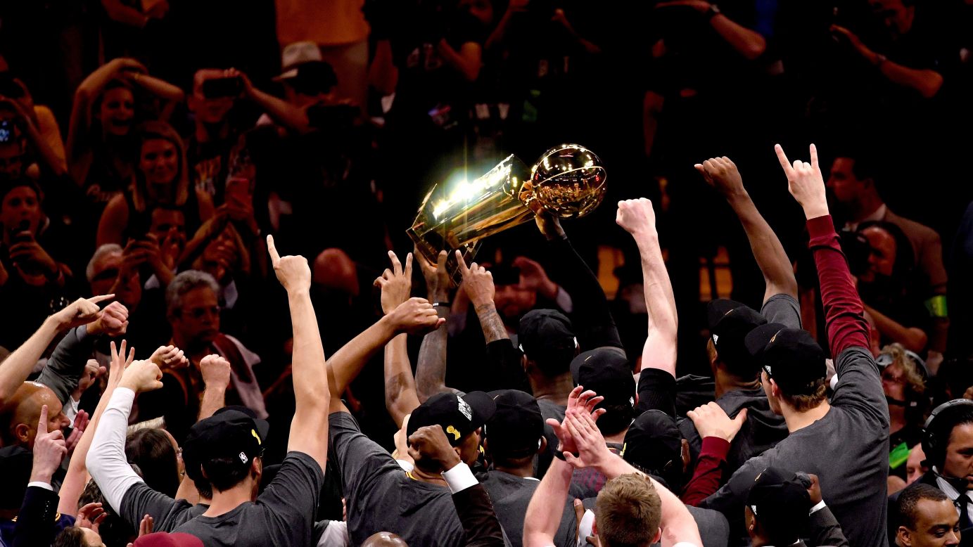 LeBron James lifts the Larry O'Brien Trophy after the Cleveland Cavaliers won the NBA Finals on Sunday, June 19. James finished with a triple-double -- 27 points, 11 rebounds and 11 assists -- and was named Finals MVP. It is the third NBA title of his career. James also won two championships with the Miami Heat. <a href="http://www.cnn.com/2016/06/14/sport/gallery/what-a-shot-sports-0614/index.html" target="_blank">See 33 amazing sports photos from last week</a>