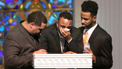 From left, Michael Marquez, Isaiah Henderson and Robert Presley grieve during the funeral of their mother and Pulse shooting victim Brenda Lee Marquez-McCool in Orlando on Monday, June 20.
