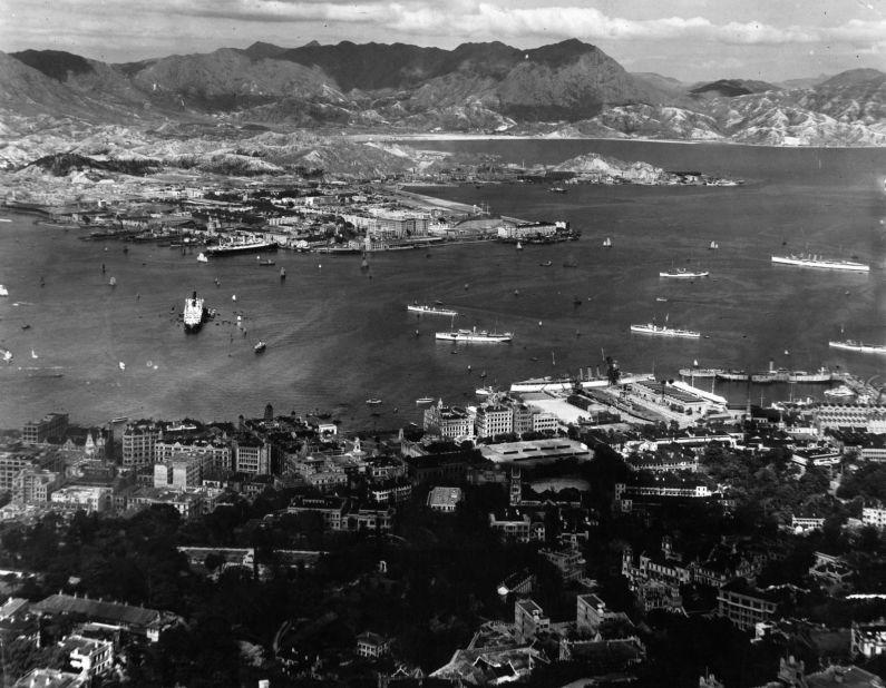A view from Victoria Peak overlooks the lower terraces of Hong Kong and the city's famous harbor in the early 1920s.