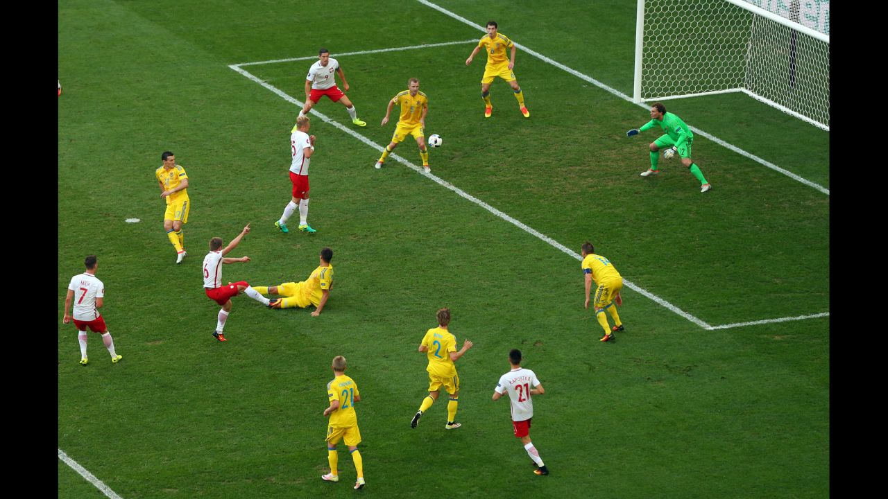 Blaszczykowski, third from left, buries his goal after coming on as a second-half substitute.