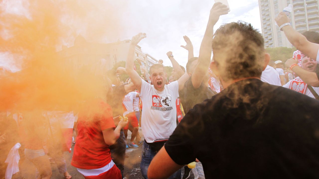 Poland supporters cheer near the stadium in Marseille.