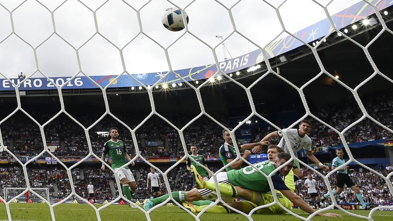 Gomez scores his first-half goal past goalkeeper Michael McGovern.