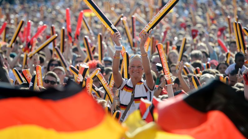 German supporters watch the match on television in Berlin.