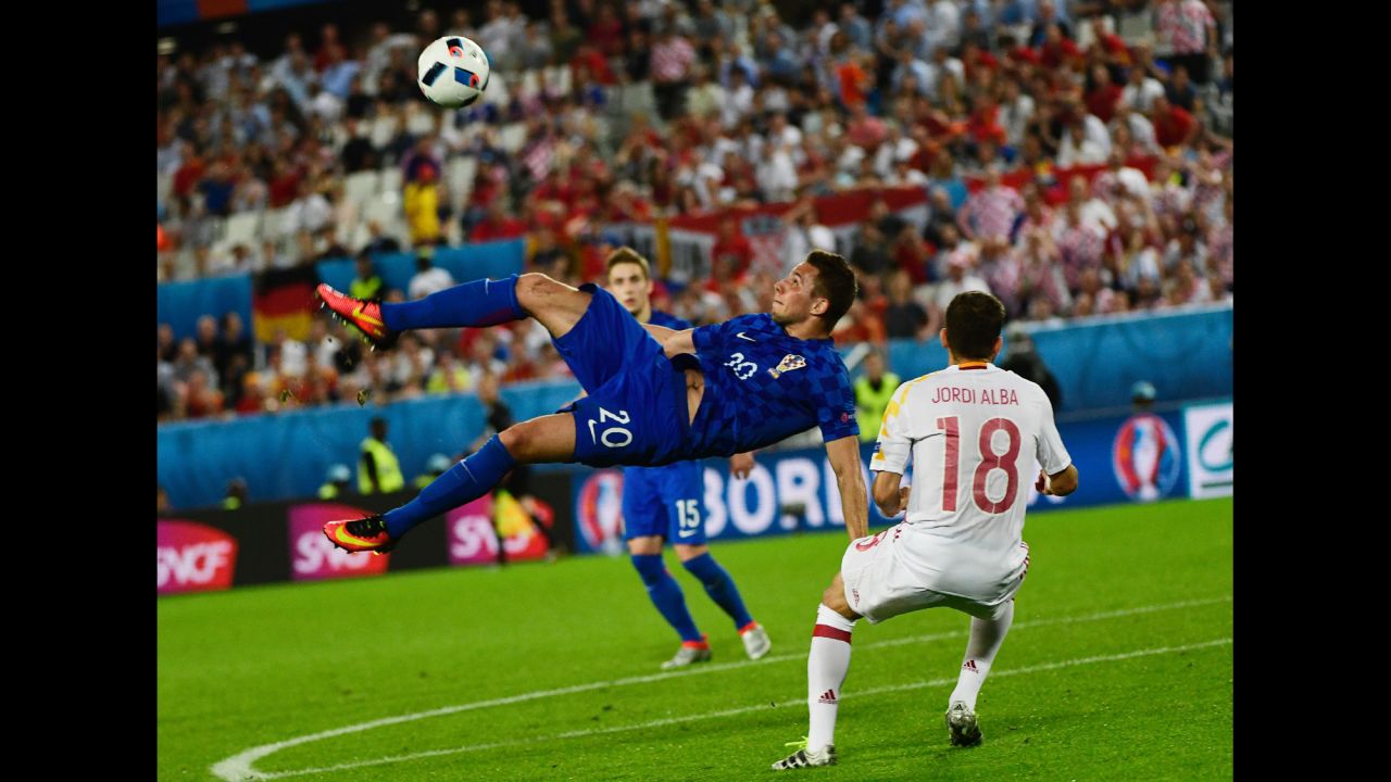 Croatia's Marko Pjaca attempts an overhead kick.