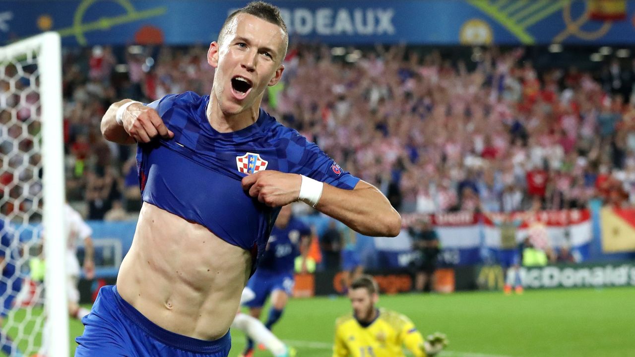 Croatia's Ivan Perisic takes off his shirt to celebrate his match-winning goal against Spain on Tuesday, June 21. He also assisted a goal in Croatia's 2-1 comeback victory. Croatia topped Group D and awaits its next opponent in the round of 16. Spain finished second in the group and has a date set with Italy.