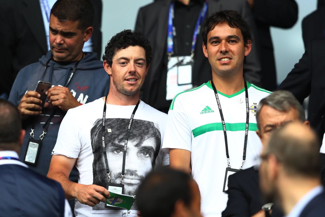 Northern Irish golf star Rory McIlroy (L) was watching his compatriots at Parc des Princes.