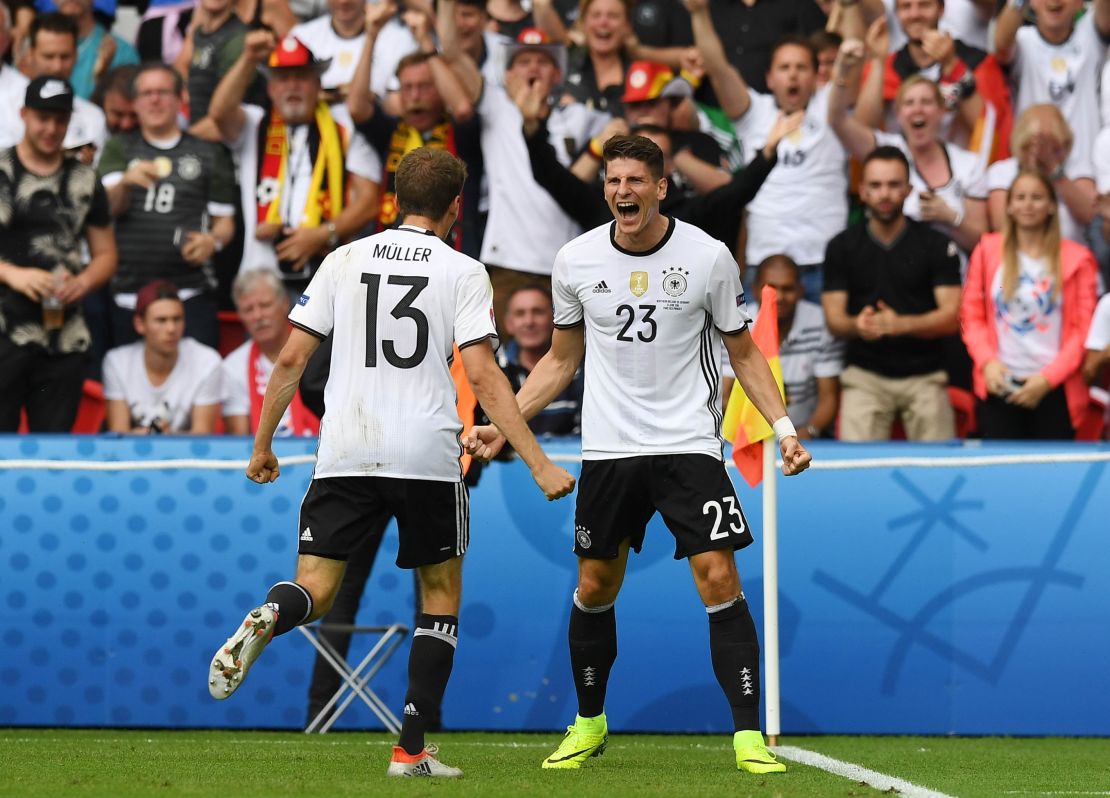 World champion Germany topped its group and faces Slovakia next.