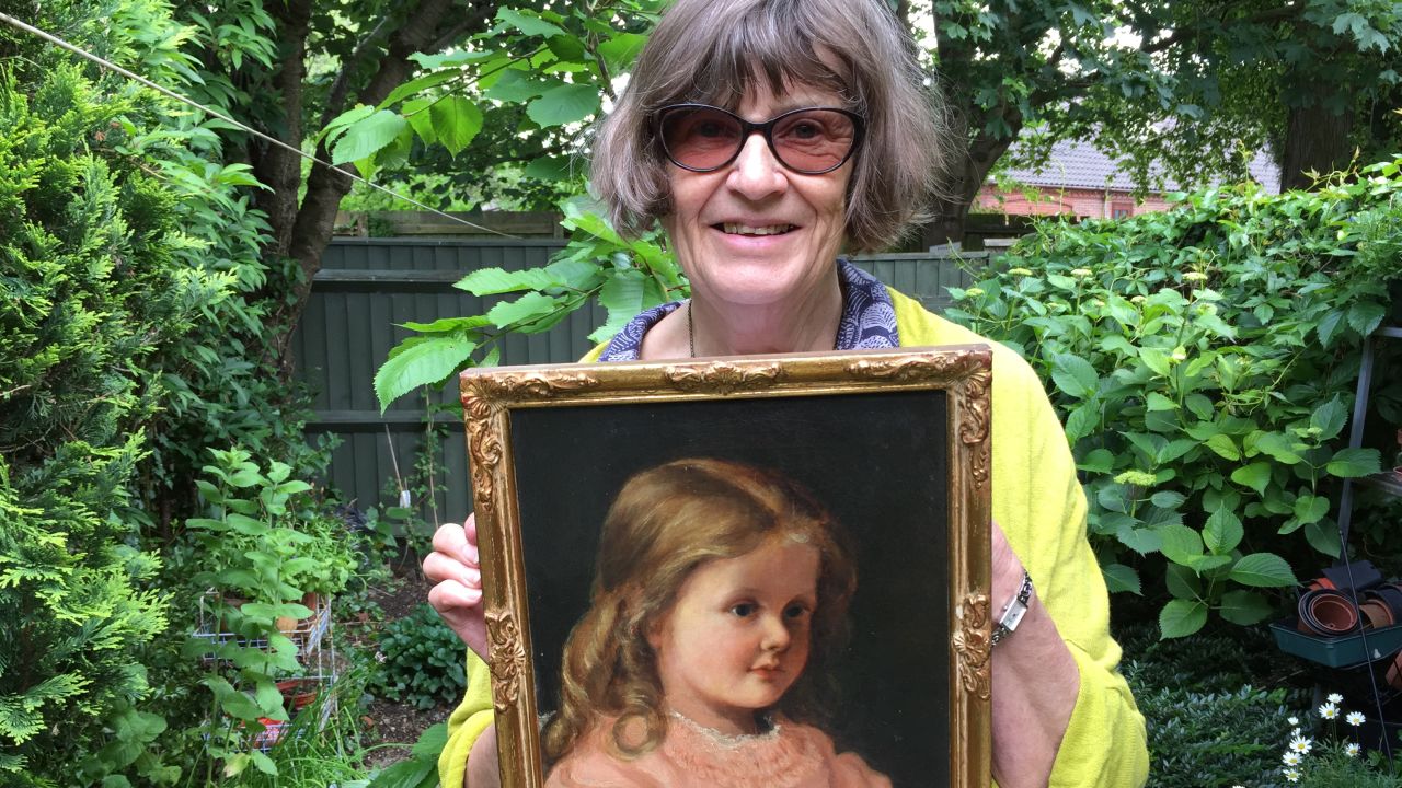Catherine Galwey with a childhood portrait of her grandmother.