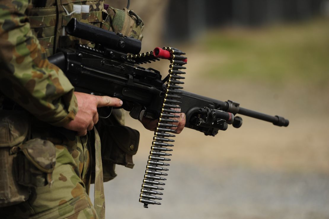 An Australian soldier is seen carrying a Minimi machine gun as part of a biennial military exercise for Australian and U.S. forces.