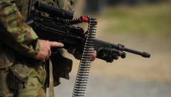 An Australian soldier is seen carrying a Minimi machine gun as part of exercise Talisman Sabre on July 9, 2015, in Rockhampton, Australia. Talisman Sabre is a biennial military exercise that trains Australian and U.S. forces to plan and conduct combined task force operations to improve combat readiness and interoperability on a variety of missions from conventional conflict to peacekeeping and humanitarian assistance efforts. TS15 will incorporate force preparation activities, Special Forces activities, amphibious landings, parachuting, land force manoeuvre, urban operations, air operations, maritime operations and the coordinated firing of live ammunition and explosive ordnance from small arms, artillery, naval vessels and aircraft. 