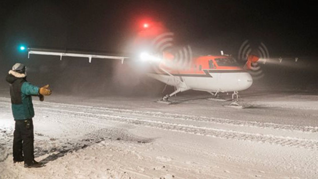 A Twin Otter aircraft taxis at the Amundsen-Scott South Pole Station.