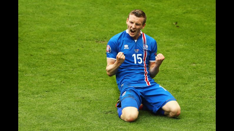 Jon Dadi Bodvarsson celebrates after scoring Iceland's first goal in the 18th minute.