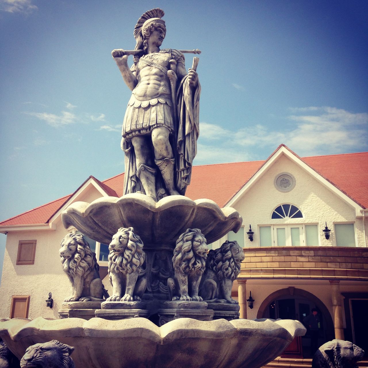 A Roman statue adorns a fountain outside the Turnberry clubhouse on what McDines describes as "one of the best golf courses in the world, if not the best."