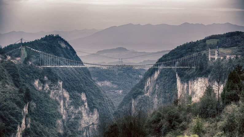 The Zhangjiajie Grand Canyon Glass Bridge stretches across two hills and is 300 meters above ground. It has a <a href="index.php?page=&url=http%3A%2F%2Fedition.cnn.com%2Ftravel%2Farticle%2Fchina-zhangjiajie-glass-bridge-closed%2Findex.html" target="_blank">glass bottom</a>.