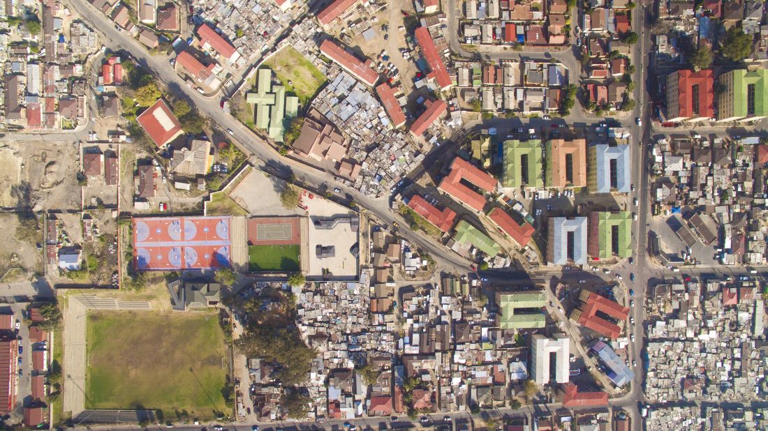 Photographer Johnny Miller has used a drone to take aerial photographs to demonstrate the gap between the wealthy and the poor in Cape Town, South Africa. "During apartheid, segregation of urban spaces was instituted as policy," he writes on the site dedicated to the project, <a href="http://unequalscenes.com/projects" target="_blank" target="_blank">Unequal Scenes</a>. It's been 22 years since the fall of apartheid, and he notes the pre-apartheid barriers still exist.
