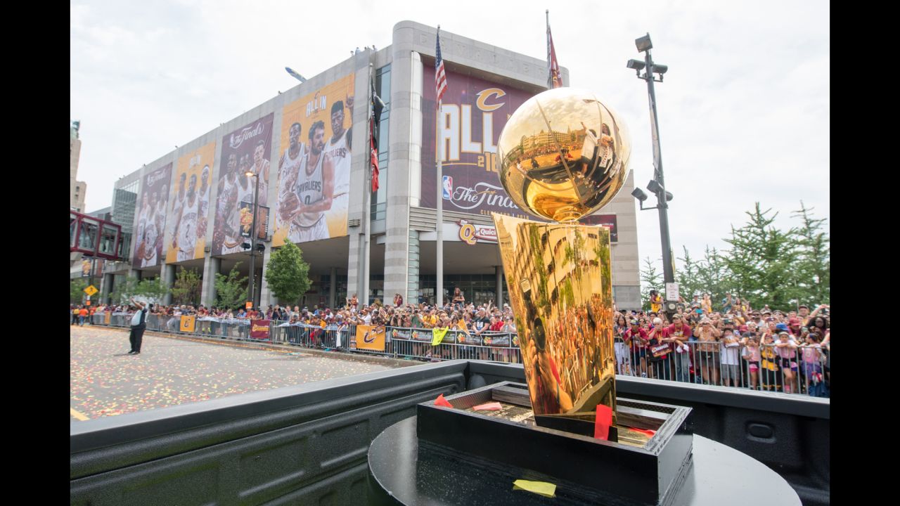 The championship trophy is driven through the parade.