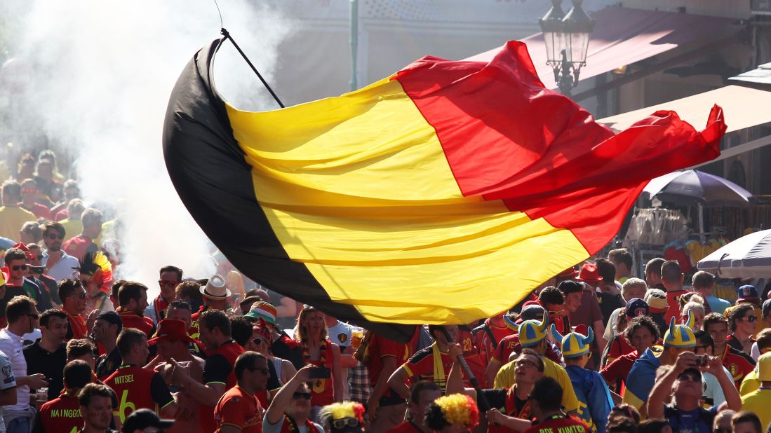 A person waves a Belgian flag before the match.