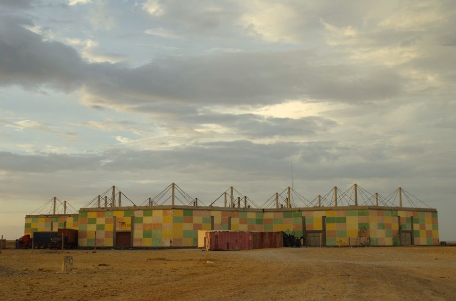 Kiluanji Kia Henda's "Icarus 13, The First Journey to the Sun" (2007) creates a fictional narrative of a solar exploration mission in Luanda, Angola, as told through photographs of futurist socialist architecture.