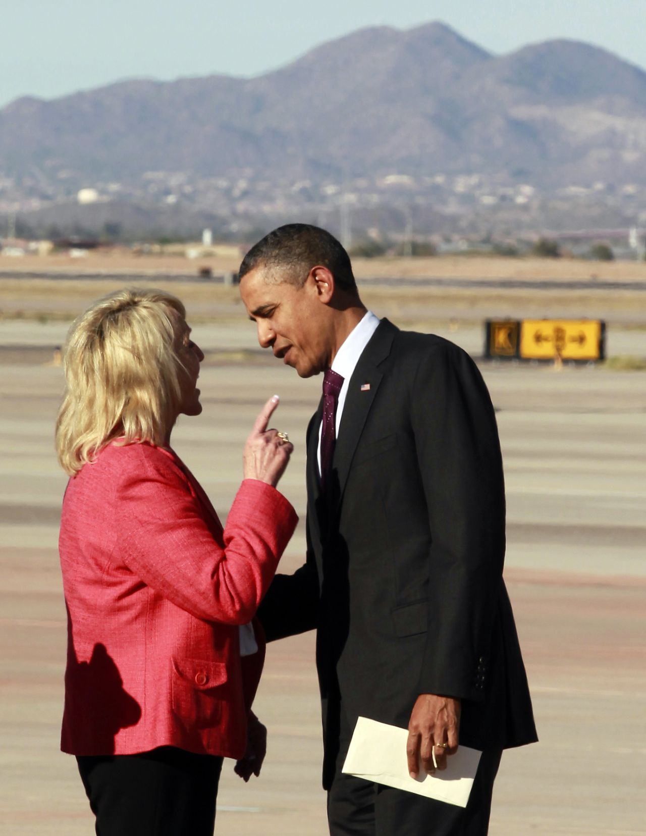 Then-Arizona Gov. Jan Brewer confronts President Obama in 2012 at a Phoenix airport -- one of several incidents that led to talk that he was being treated with less respect than his predecessors because of race. Brewer, a Republican, said Obama chided her for a book she had written; the president's defenders said her finger-wagging evoked the Jim Crow era, when whites addressed black men like they were boys.