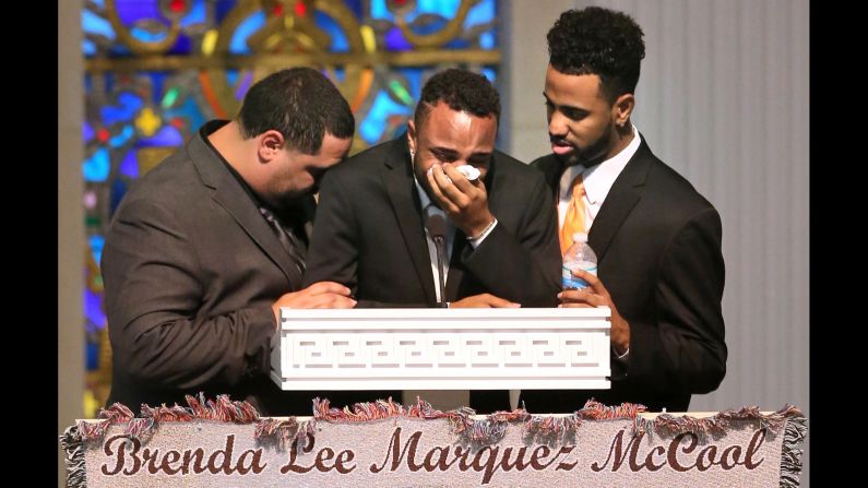 Michael Marquez, Isaiah Henderson and Robert Presley grieve during the funeral of their mother, Brenda Lee Marquez McCool, at a church in Orlando on Monday, June 20. She was one of <a href="http://www.cnn.com/interactive/2016/06/us/orlando-attack-victims/" target="_blank">the 49 people killed</a> in the Orlando nightclub shooting earlier this month. Henderson, center, was at the nightclub with her when she was shot.
