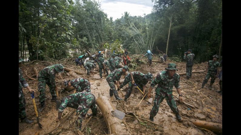 Soldiers search for landslide victims in Purworejo, Indonesia, on Sunday, June 19. At least 35 people died after heavy rains and floods <a href="http://www.cnn.com/2016/06/19/asia/indonesia-central-java-landslides/" target="_blank">triggered landslides</a> in the province of Central Java.