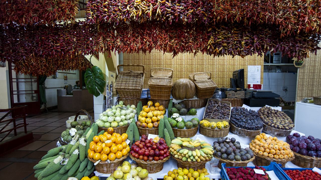 With a daily show of fresh fish, colorful fruit and grizzly selections of offal, markets have become a popular tourist attraction in Portugal.