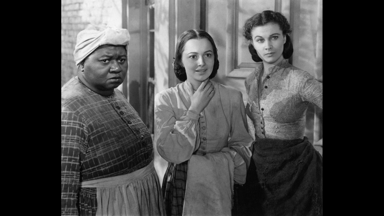 Most actresses were dying to play Scarlett in the film of Margaret Mitchell's best-seller, "Gone With the Wind," but de Havilland, center, had her eyes on Melanie. The actress pushed for Warner Bros. to loan her out to producer David O. Selznick for his 1939 epic. She received the first of five Oscar nominations, losing to co-star Hattie McDaniel, left, as best supporting actress, while Vivien Leigh, as Scarlett, took home the best actress award. <a href="http://www.vanityfair.com/hollywood/2016/04/olivia-de-havilland-joan-fontaine-sibling-rivalry" target="_blank" target="_blank">De Havilland recently told Vanity Fair that McDaniel,</a> the first African-American to win an Oscar, "was the best" and "it was wonderful that she should win."