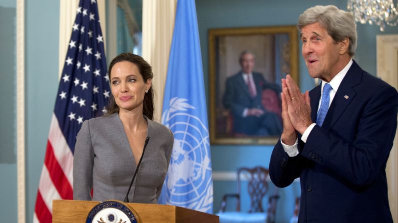 U.S. Secretary of State John Kerry meets with actress <a href="http://www.cnn.com/2013/05/14/showbiz/gallery/angelina-jolie/index.html" target="_blank">Angelina Jolie, </a>special envoy for the United Nations' refugee agency, at the State Department in Washington on Monday, June 20. Both delivered statements on what was World Refugee Day. "I ask people to understand that with 65 million people displaced by conflict, we are facing a world of wars we cannot ignore or turn our backs on," Jolie said. "To do that would be naive, irresponsible, and dangerous."