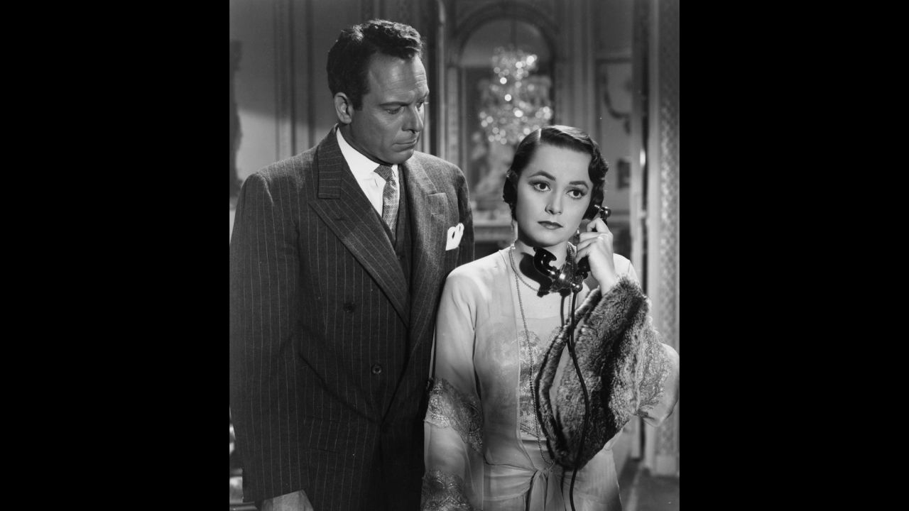 De Havilland was off the screen for nearly three years while she battled Warner Bros. After winning her court case, she was free to chart her own career and scored her first Academy Award in "To Each His Own" (1946), here with Bill Goodwin. The part required a greater range from her than earlier roles as she matured from a young unwed mother into a older career woman.