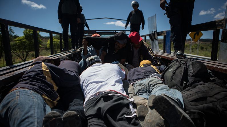 Police detain protesters in Nochixtlan, Mexico, during <a href="http://www.cnn.com/2016/06/20/americas/oaxaca-mexico-clashes/" target="_blank">clashes with striking teachers</a> on Sunday, June 19. Eight people died after protests turned violent, authorities said. The clashes also left 53 civilians and 55 police officers injured, according to the Oaxaca state government. Teachers across Mexico have been protesting national education reforms that would change the way they're evaluated. The latest wave of protests picked up steam after authorities arrested several leaders of a division of the national teachers union.