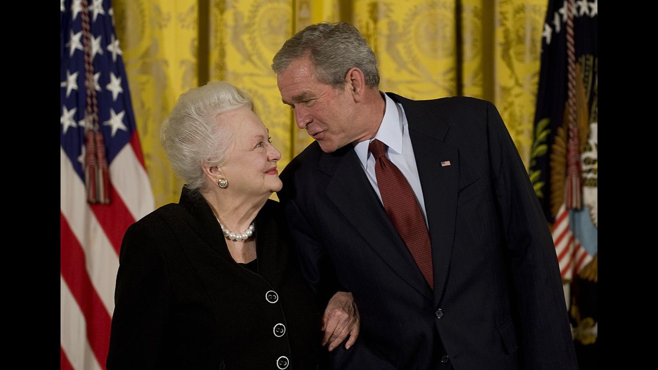 U.S. President George W. Bush presents de Havilland with the National Medal of Arts at the White House in November 2008. <a href="https://www.arts.gov/honors/medals/olivia-de-havilland" target="_blank" target="_blank">The star was recognized</a> "for her lifetime achievements and contributions to American culture as an actress."