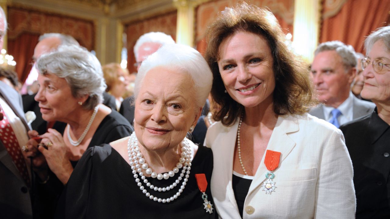 De Havilland and fellow actress Jacqueline Bisset receive the Legion of Honor, one of France's top awards, at the Élysée Palace in Paris in September 2010. The "Gone With the Wind" star has called the French capital home for six decades.