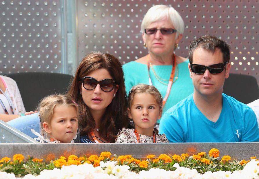 His daughters are often seen at tournaments -- here with their mother, herself a former tennis pro, in Madrid in 2013. The boys, born in 2014, also accompany the family on tour.