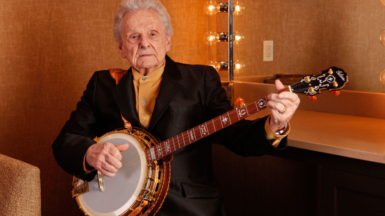 FILE - In this March 11, 2011 file photo Ralph Stanley poses for a photo backstage at the Grand Ole Opry House in Nashville, Tenn. Stanley, the last of the original bluegrass legends arrives Saturday, June 14, 2014, at the Huck Finn Jubilee in Ontario for a rare Southern California appearance that was to be part of a farewell tour, that was until he put his retirement on hold. (AP Photo/Ed Rode, File)