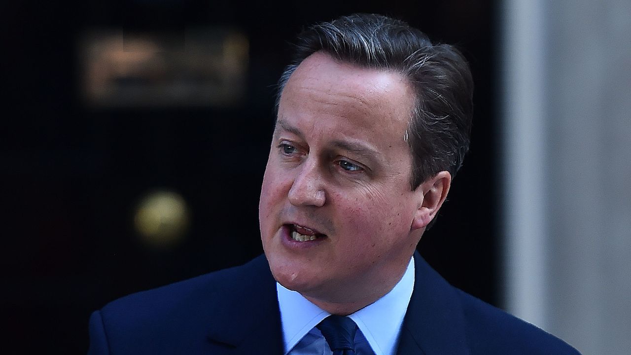 British Prime Minister David Cameron speaks to the press outside 10 Downing street in central London on June 24, 2016.
Prime Minister David Cameron announced Friday he will resign after Britons voted to leave the EU in defiance of his warnings of economic pain.