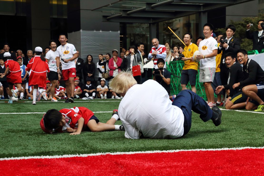Johnson caused a stir when he knocked over a 10-year-old schoolboy while playing Rugby in Japan.