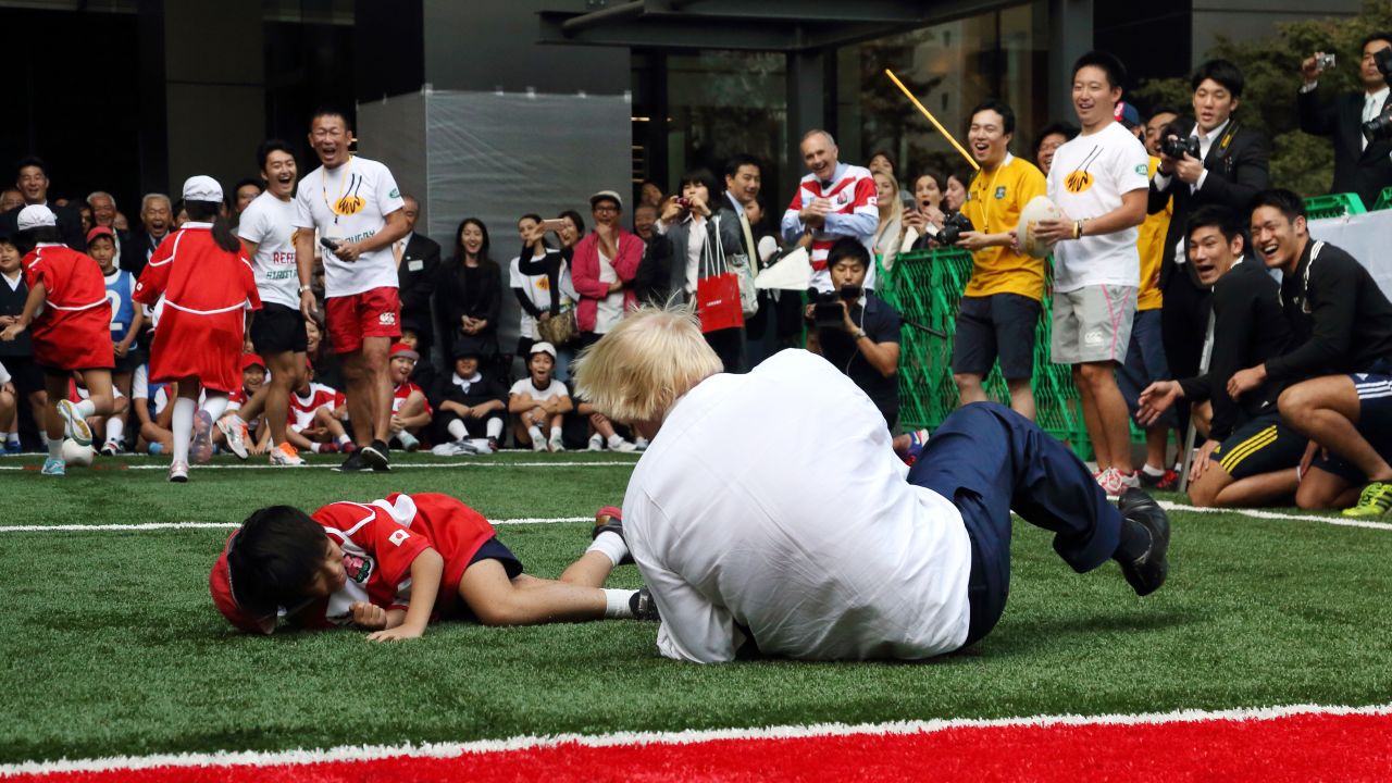 Johnson caused a stir when he knocked over a 10-year-old schoolboy while playing Rugby in Japan.